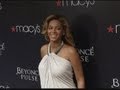 Hot mama: Beyonce glows at perfume launch